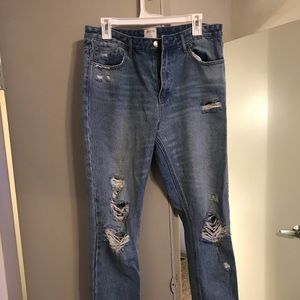 Distressed high-waisted denim jeans
